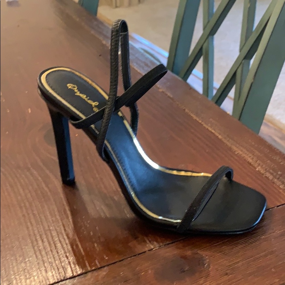 Never worn black heels